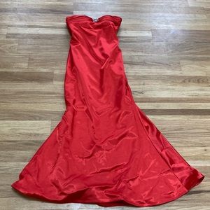 Beautiful red formal dress with silver beading at the bust. Altered to size 0.